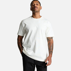 Male model wearing Look Design custom branded t-shirt in white