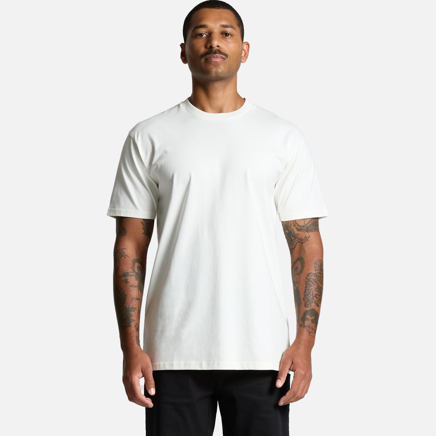 Male model wearing Look Design custom branded t-shirt in white