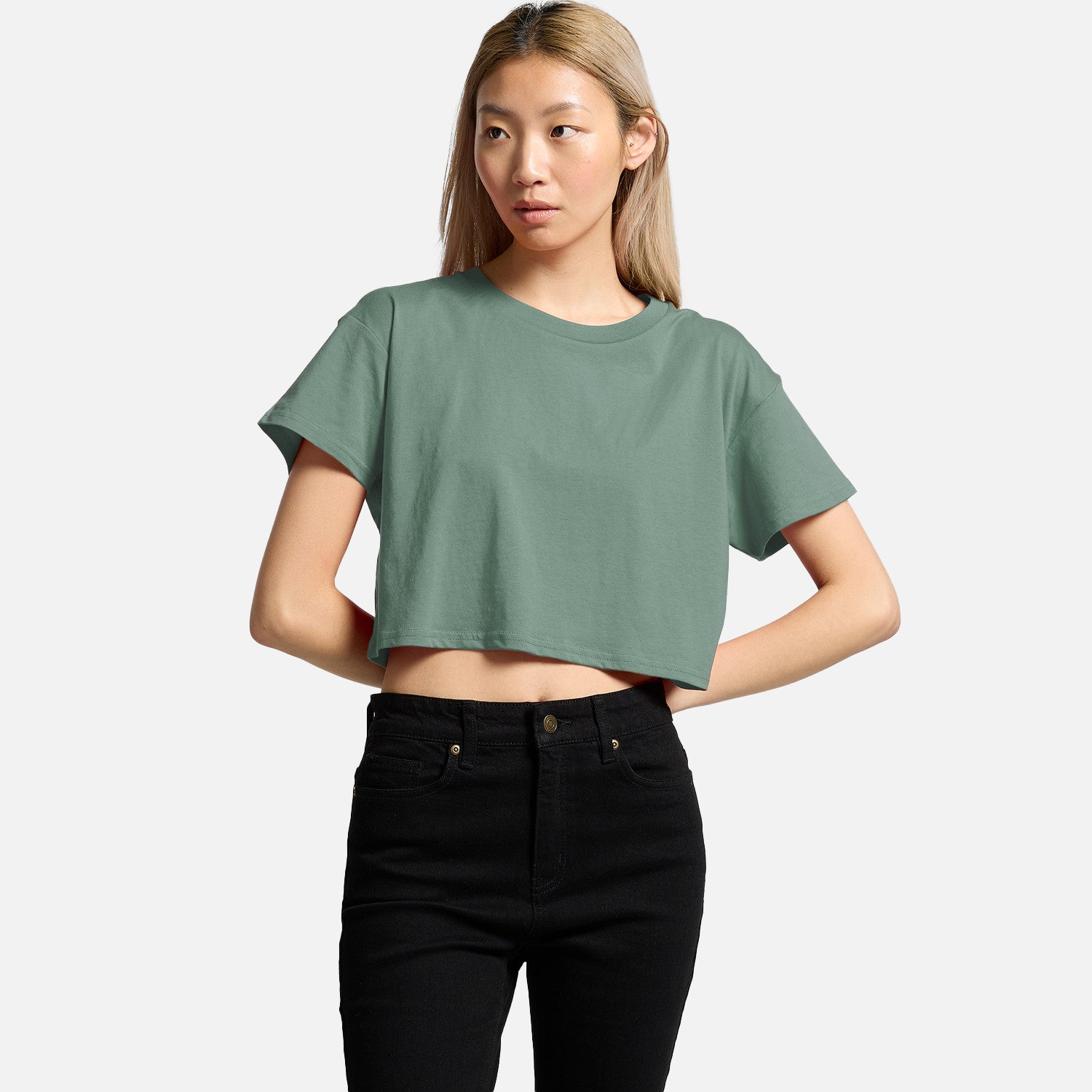 Female model wearing Look Design custom branded crop t-shirt in green