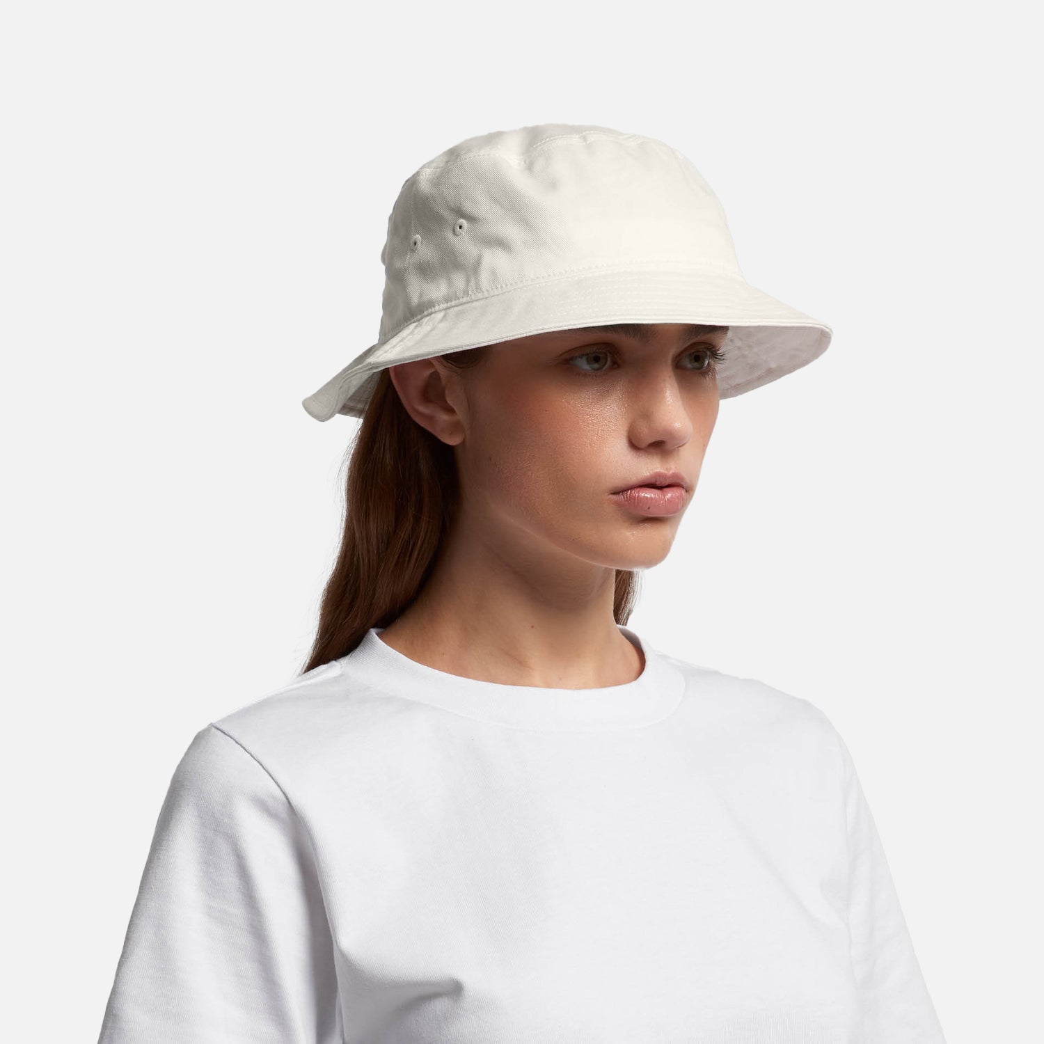 Female model wearing Look Design custom branded bucket hat in white