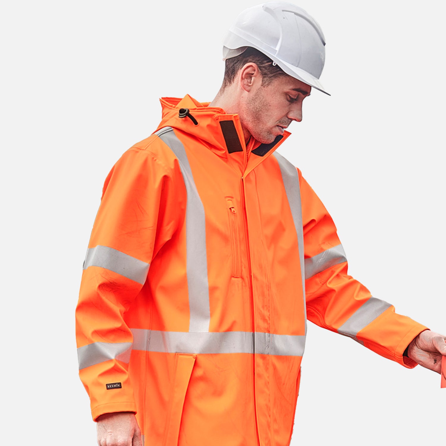 Male worker wearing Look Design custom branded collared Hi Vis in bright orange and reflective silver stripes