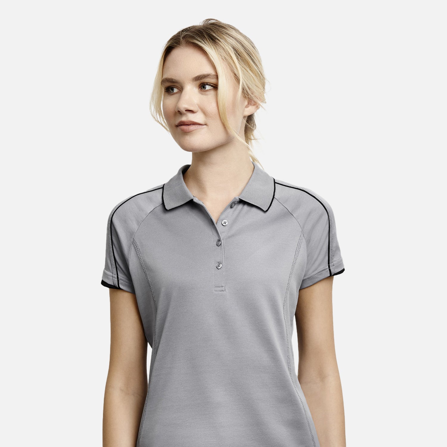 Female model wearing Look Design custom branded polos in grey