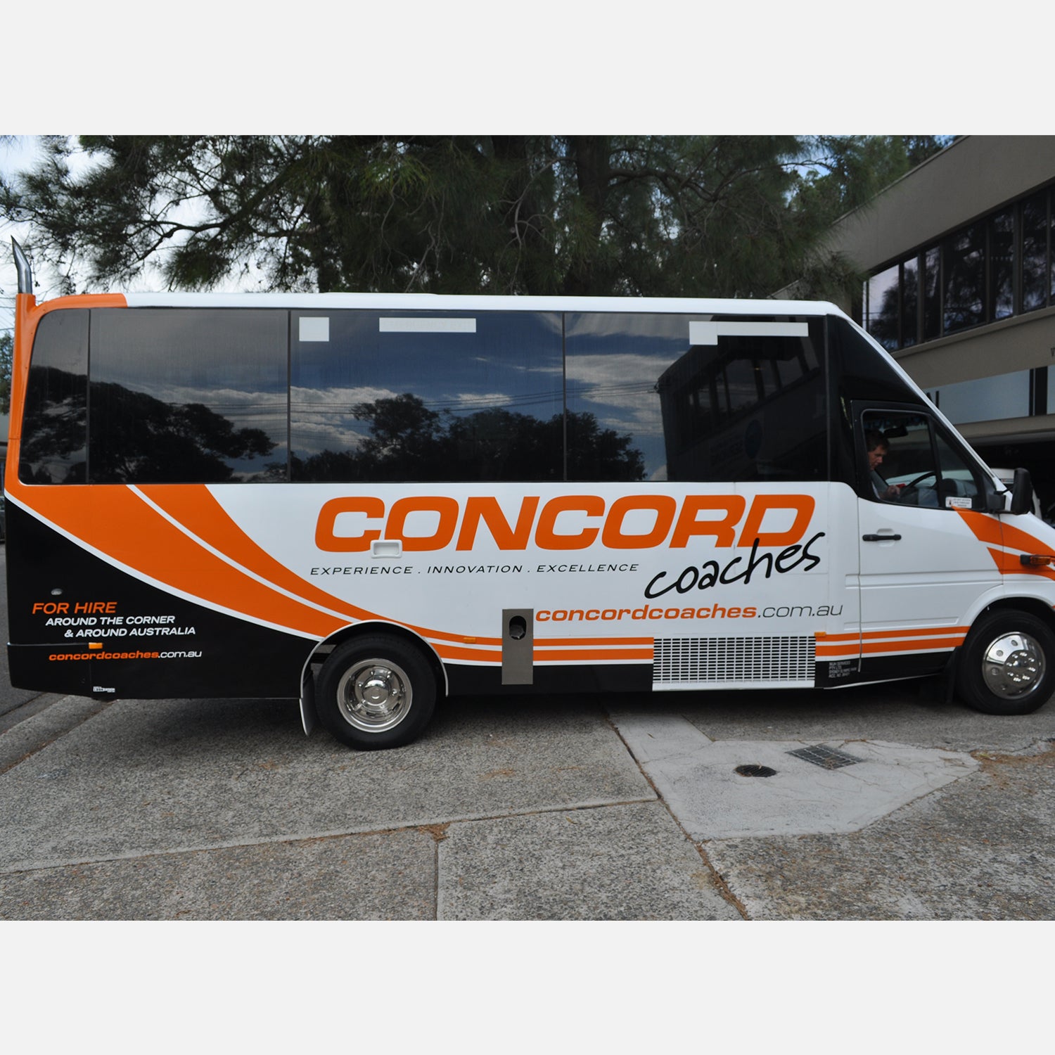 Look Design custom branded vehicle full wraps on a coach bus